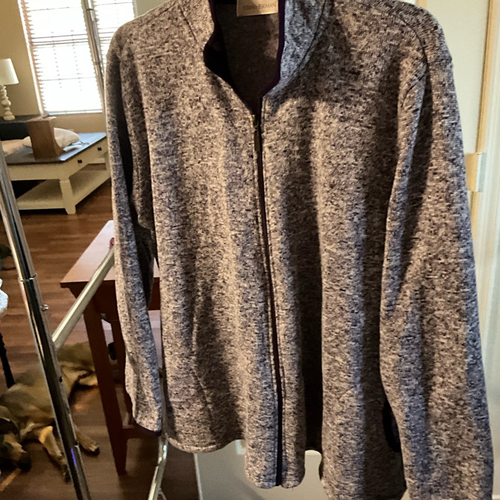 Purple/white tweet type colors warm jacket. Full zipper with pockets